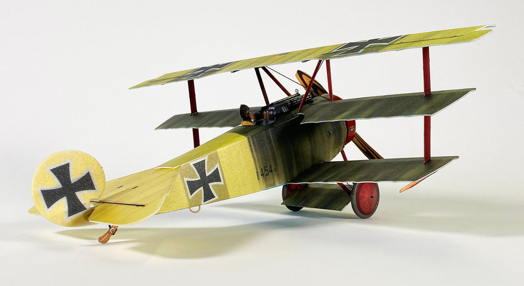 The cockpit and guns on a WWI German Fokker DR1 fighter Triplane in a The cockpit and guns on a WWI German Fokker DR1 fighter Triplane in a